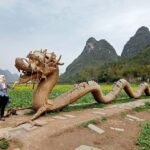 A dragon sculpture on the banks of the Yulong River, China.
